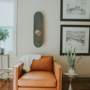 Skateboard on a living room wall