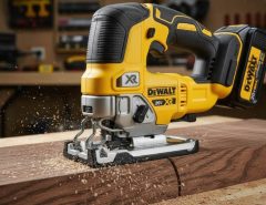 DEWALT 20V MAX Jig Saw cutting through hardwood with precision and ease