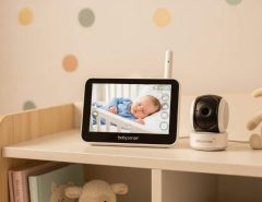 Babysense video baby monitor parent unit displaying clear HD image alongside camera unit on nursery shelf
