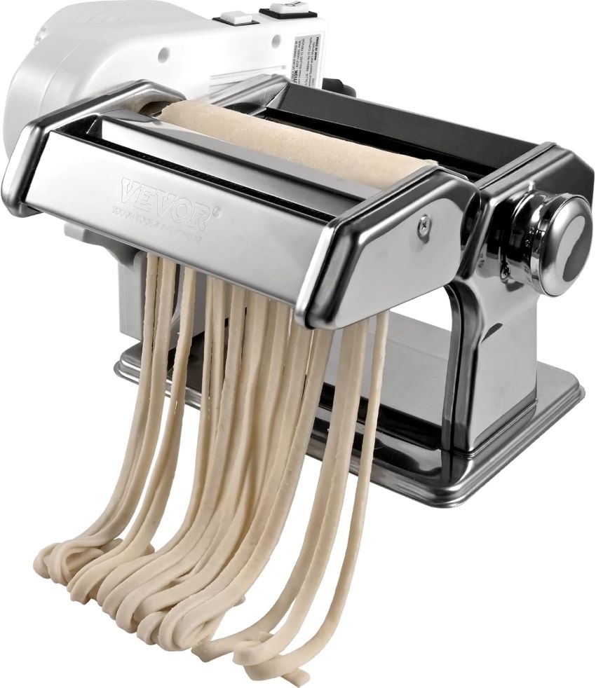 Fresh pasta in various shapes being made with the VEVOR electric pasta maker in a kitchen.