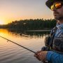 angler wearing polarized fishing sunglasses near water