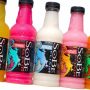 Vintage SoBe drink bottles displayed on a retail shelf with colorful packaging and lizard logo