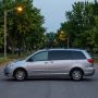Stealth camper van parked legally on a quiet San Diego street