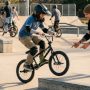 Beginner learning BMX tricks on a bike