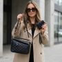 Woman wearing a stylish FashionPuzzle crossbody bag outdoors
